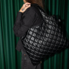 MM.PB.M-LOQI-puffy-metallic-black-medium-bag2.png