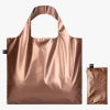 MM.RO.Z-LOQI-metallic-rose-gold-bag-with-zip-pocket.webp